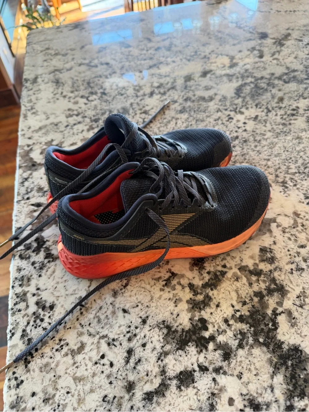 Reebok Men's Black Athletic Running Shoes with Orange Midsole